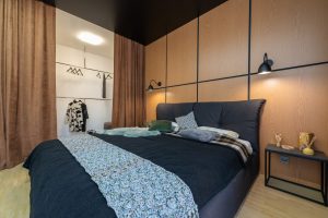 Bedroom interior with wardrobe and shining lamps